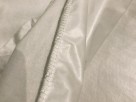 vnitřní strana: vrchní textilie s tenkým voděodolným zátěrem sešitá s textílií, která chrání matraci po stranách